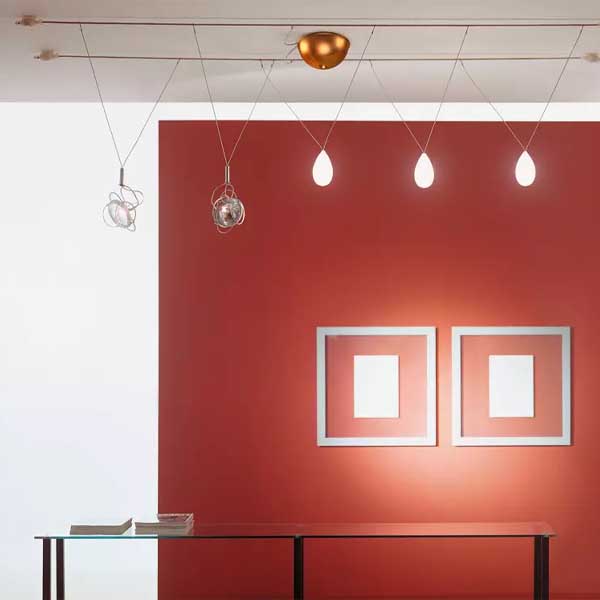 red wall with luxury light fixtures